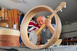 Simon Middleton with a prototype Shackleton banjo, with optional Oak & Birch rim in foreground
