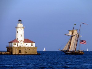 Ship and Lighthouse, Lake Michigan. Photo by K. Bigger