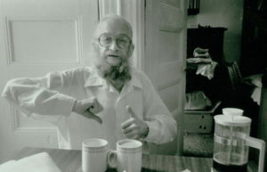Harry Smith curates coffee in Allen Ginsburg's kitchen, ca. mid to late 1980s. Photo by Allen Ginsburg